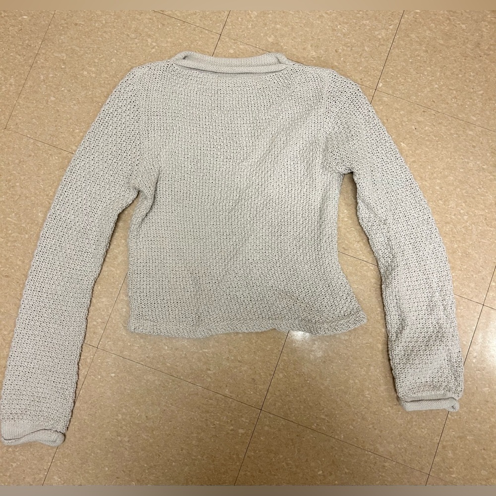 Tan knit sweater, fits a size small